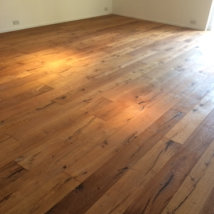 A new reclaimed oiled oak floor .